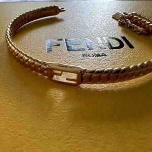 Fendi gold plated size SM bracelet with clasp closure